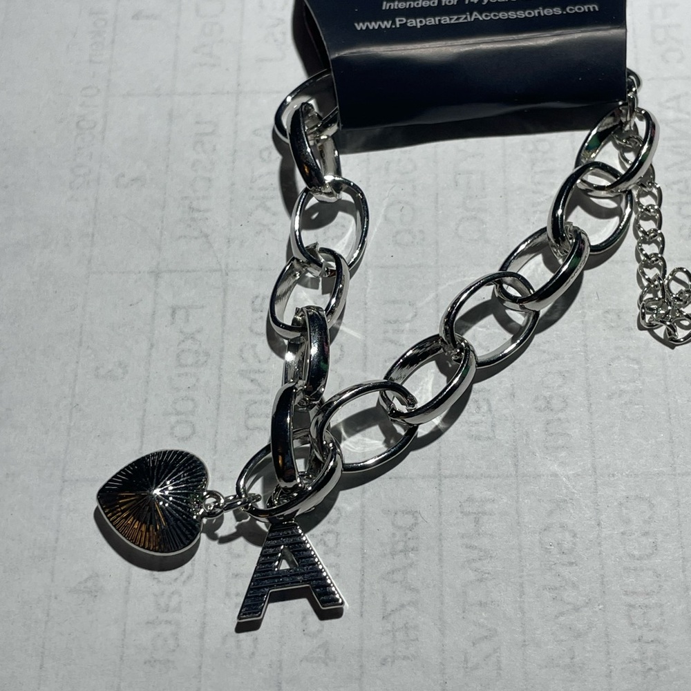 2 A bracelets- Silver Chain Bracelet with Charms and leather strap bracelet
